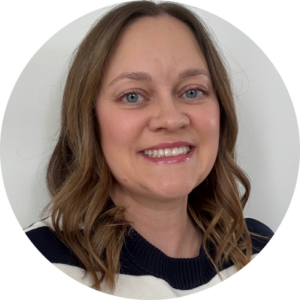 Janelle Gates, counselling psychology practicum student, smiling headshot portrait.